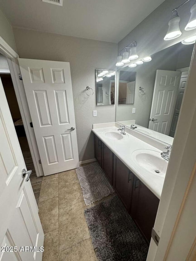 28306 N 25th Dl, Phoenix, AZ 85085 - bathroom featuring double vanity and tile patterned floors