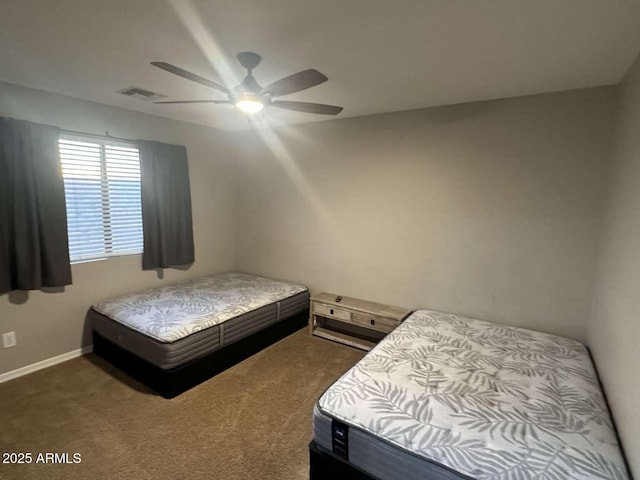 28306 N 25th Dl, Phoenix, AZ 85085 - carpeted bedroom featuring baseboards and ceiling fan