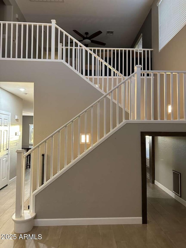 28306 N 25th Dl, Phoenix, AZ 85085 - stairway with ceiling fan and baseboards