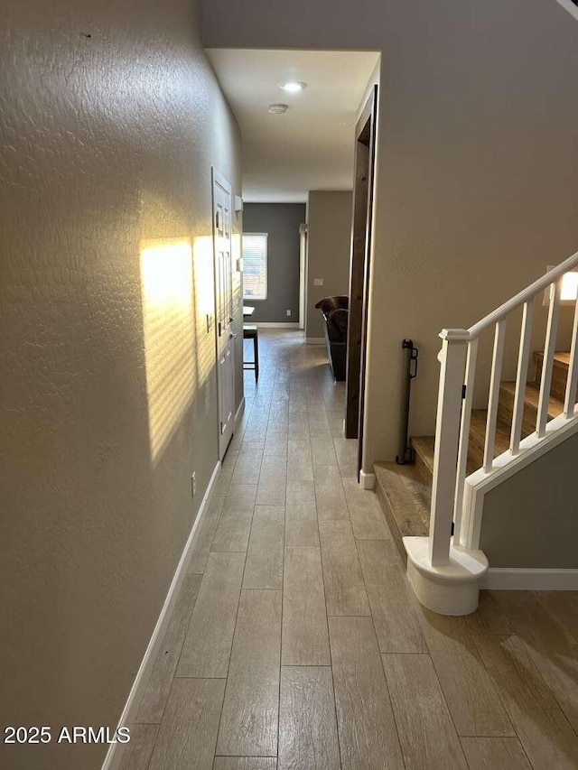 28306 N 25th Dl, Phoenix, AZ 85085 - hallway with wood-type flooring and stairs