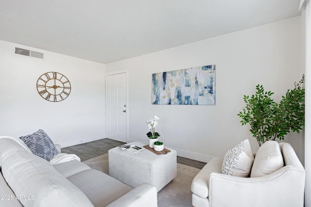 616 S Hardy Dr Unit 203, Tempe, AZ 85281 - living room featuring wood finished floors and baseboards