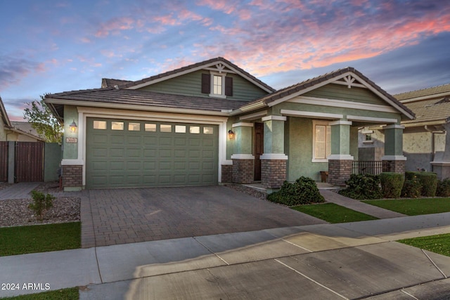 craftsman-style home with a garage