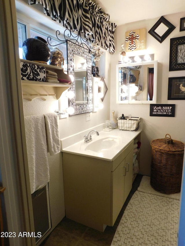 bathroom featuring tile patterned floors and vanity