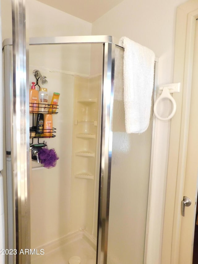 bathroom featuring a stall shower