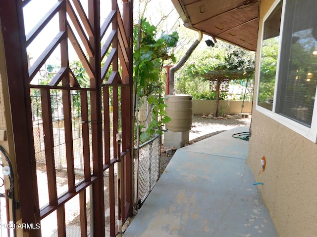 view of patio / terrace with a gate and fence