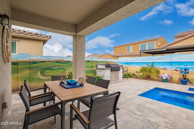 view of patio / terrace with outdoor dining space and area for grilling