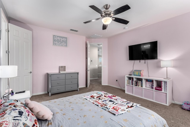 carpeted bedroom featuring visible vents, ceiling fan, and baseboards