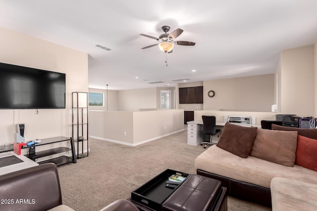 carpeted living area featuring visible vents, recessed lighting, a ceiling fan, and baseboards