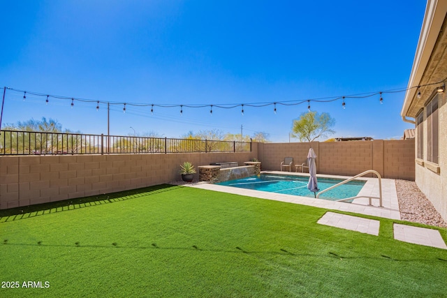 view of swimming pool featuring a fenced in pool, a fenced backyard, and a lawn