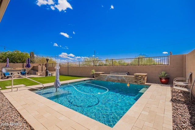 view of pool featuring a patio, a fenced backyard, and a fenced in pool