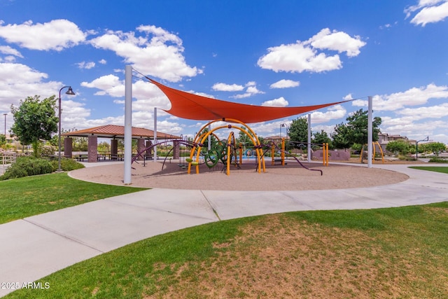 community jungle gym featuring a gazebo and a lawn