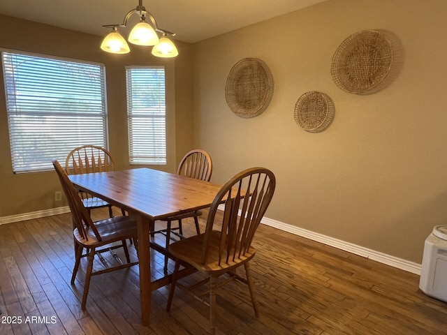 19943 N 77th Ave, Glendale, AZ 85308 - dining room with dark wood-type flooring and a chandelier