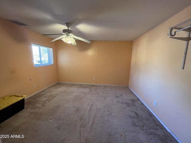 unfurnished room with carpet floors and ceiling fan