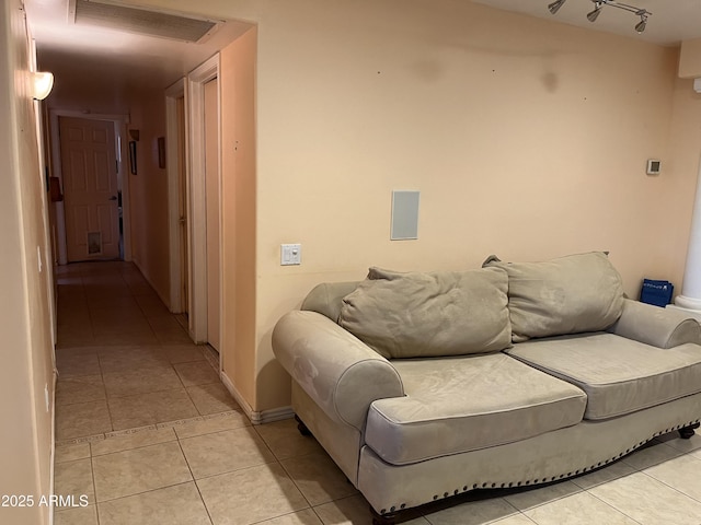 living room with light tile patterned floors