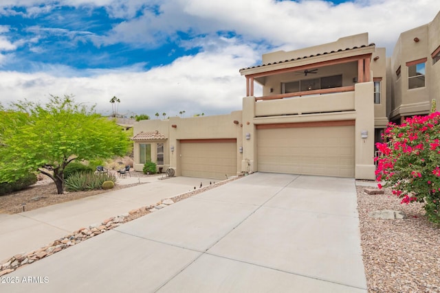 12642 N Mountainside Dr Unit B, Fountain Hills, AZ 85268 - pueblo revival-style home featuring stucco siding, a balcony, and concrete driveway