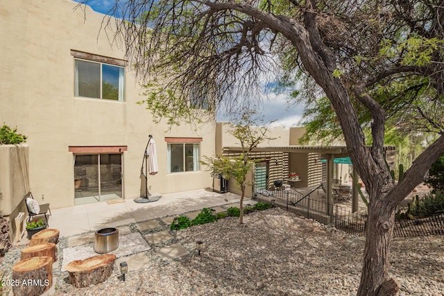 12642 N Mountainside Dr Unit B, Fountain Hills, AZ 85268 - back of property with stucco siding and a patio