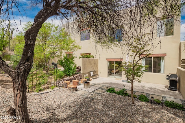 12642 N Mountainside Dr Unit B, Fountain Hills, AZ 85268 - back of property featuring stucco siding and a patio area
