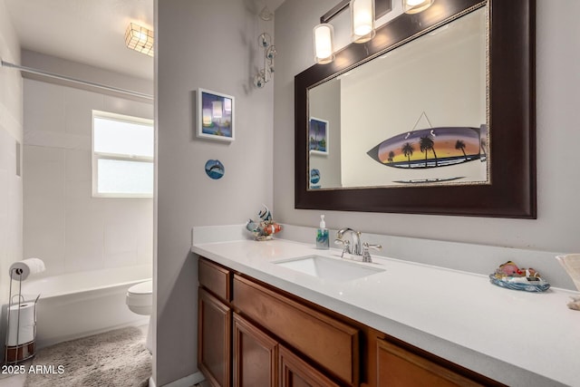 bathroom featuring toilet, vanity, and shower / tub combination