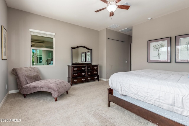 bedroom with carpet flooring, baseboards, and a ceiling fan
