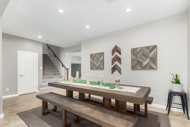 dining area featuring light tile patterned floors