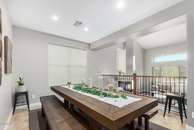 dining area with light tile patterned flooring