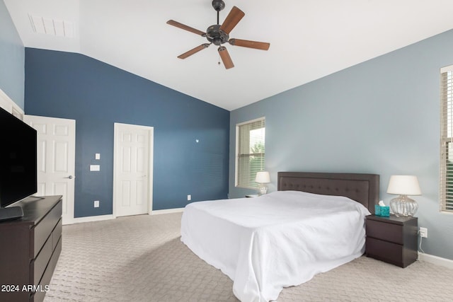 carpeted bedroom with high vaulted ceiling and ceiling fan