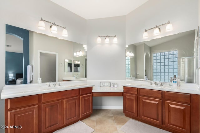 bathroom with vanity and tile patterned flooring