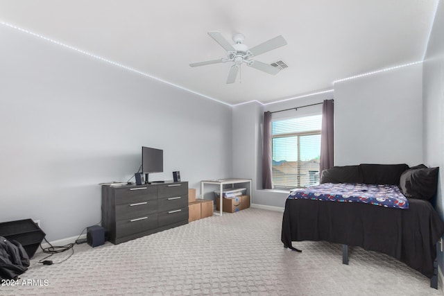 carpeted bedroom featuring ceiling fan