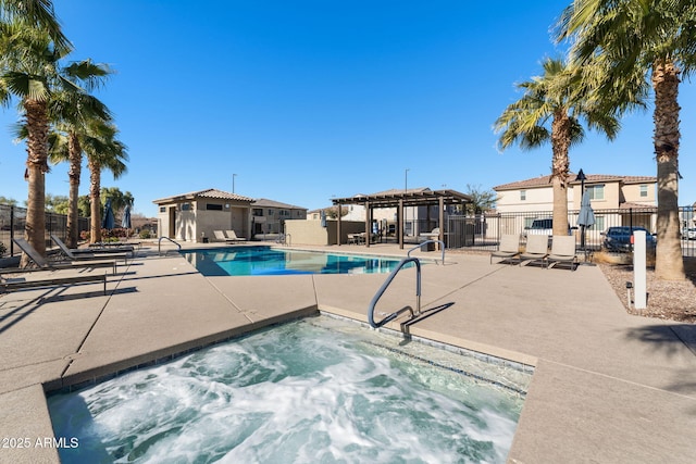 view of pool featuring a hot tub, a patio area, and a pergola