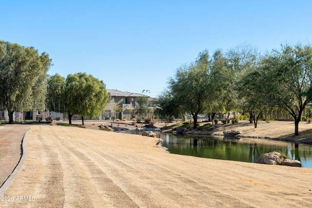 view of property's community with a water view