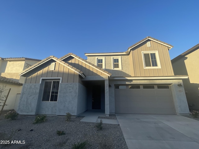 view of front of property with a garage