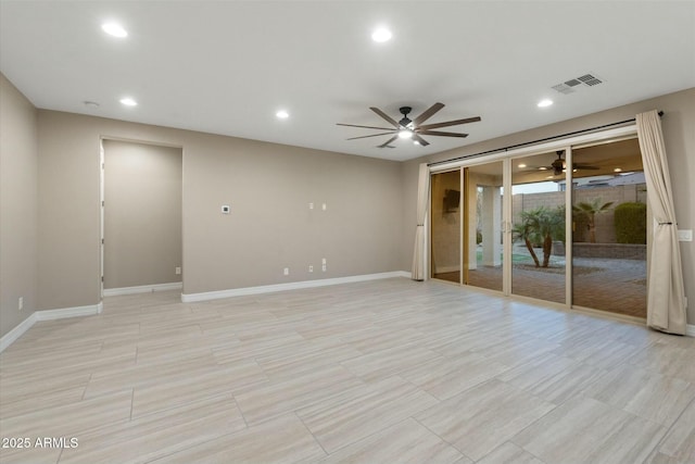 unfurnished room with ceiling fan