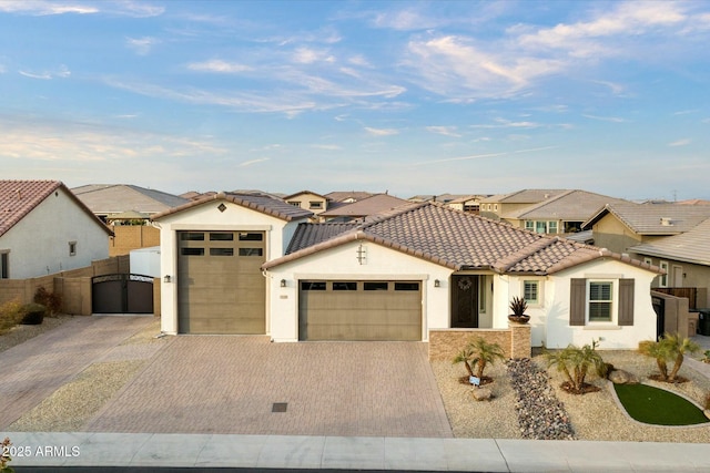 view of front of property with a garage