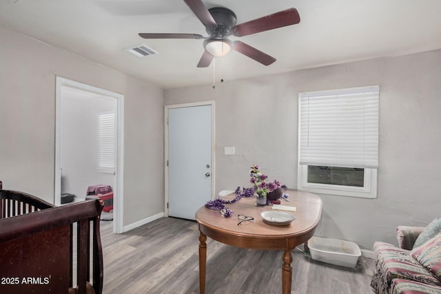 dining area featuring ceiling fan and light hardwood / wood-style flooring