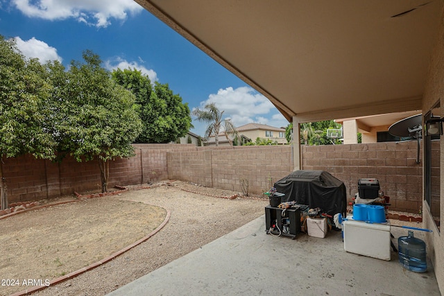 view of patio with a grill