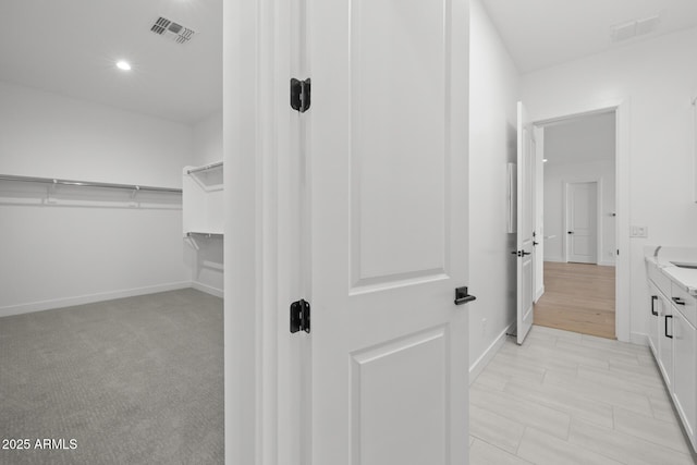 spacious closet with visible vents