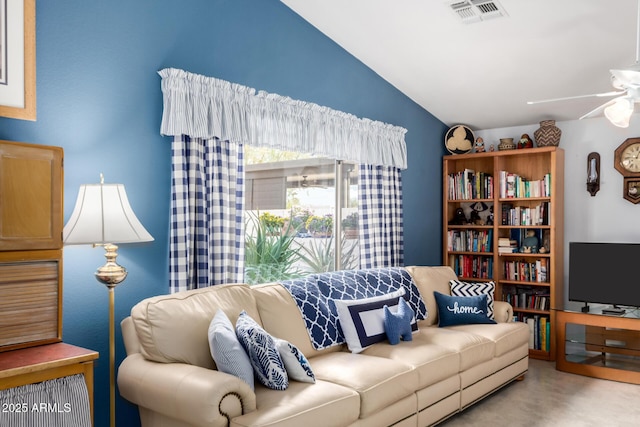 living room with vaulted ceiling, a ceiling fan, and visible vents