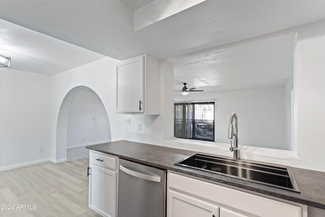 kitchen featuring ceiling fan, dishwasher, sink, light hardwood / wood-style flooring, and white cabinets