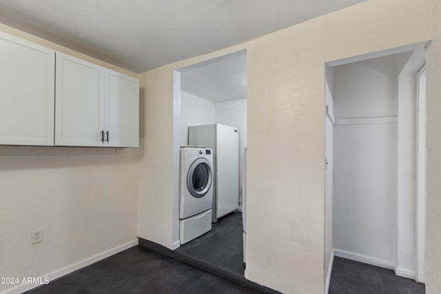 laundry area with washer / dryer