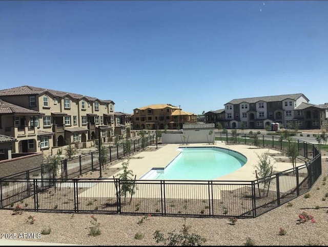 1255 N Arizona Ave Unit 1235, Chandler, AZ 85225 - community pool featuring a patio area and a residential view