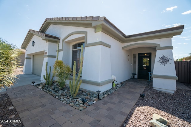 view of front of property with a garage