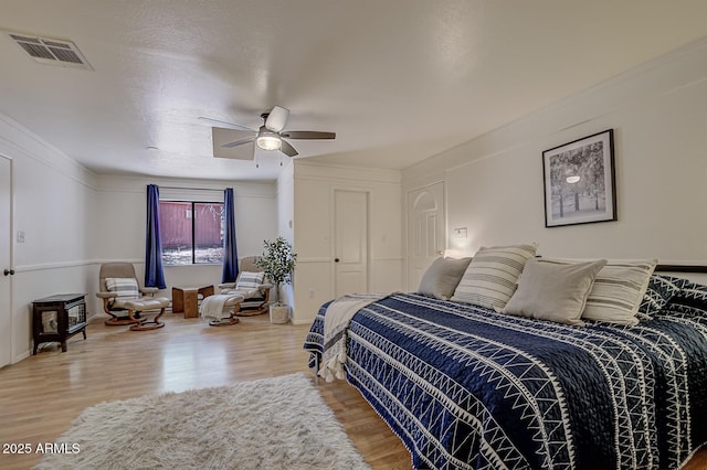 3440 N Meadow Dr, Pine, AZ 85544 - bedroom featuring wood finished floors, a ceiling fan, and ornamental molding