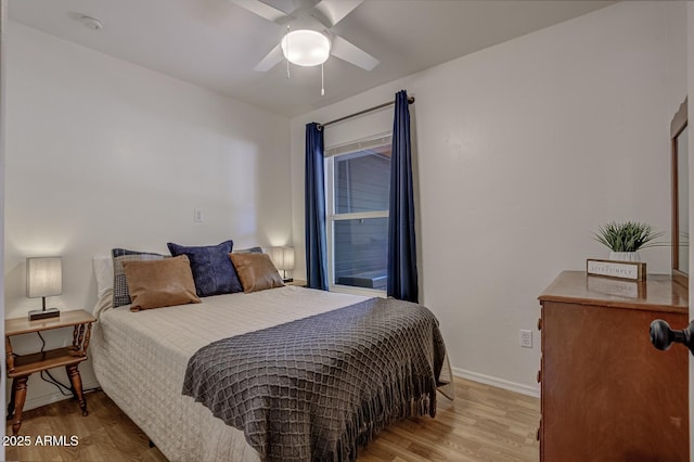 3440 N Meadow Dr, Pine, AZ 85544 - bedroom with wood finished floors, baseboards, and a ceiling fan