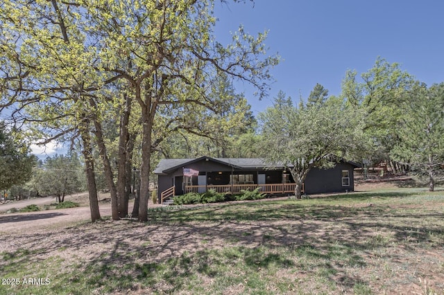 3440 N Meadow Dr, Pine, AZ 85544 - ranch-style house featuring a front lawn and covered porch