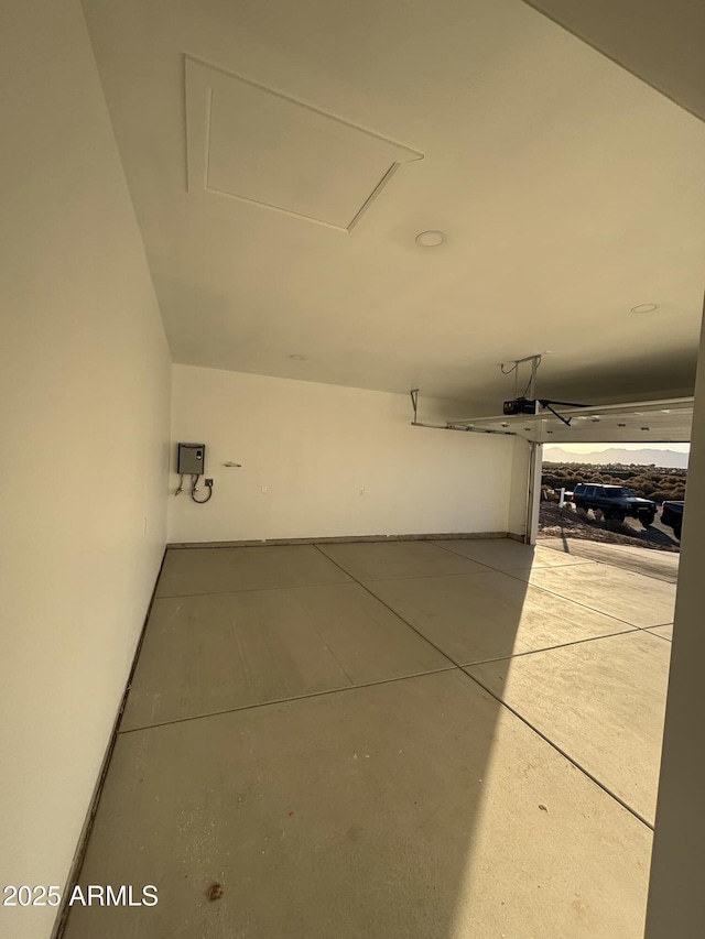 3627 W Palmaire Ave, Phoenix, AZ 85051 - garage featuring a garage door opener