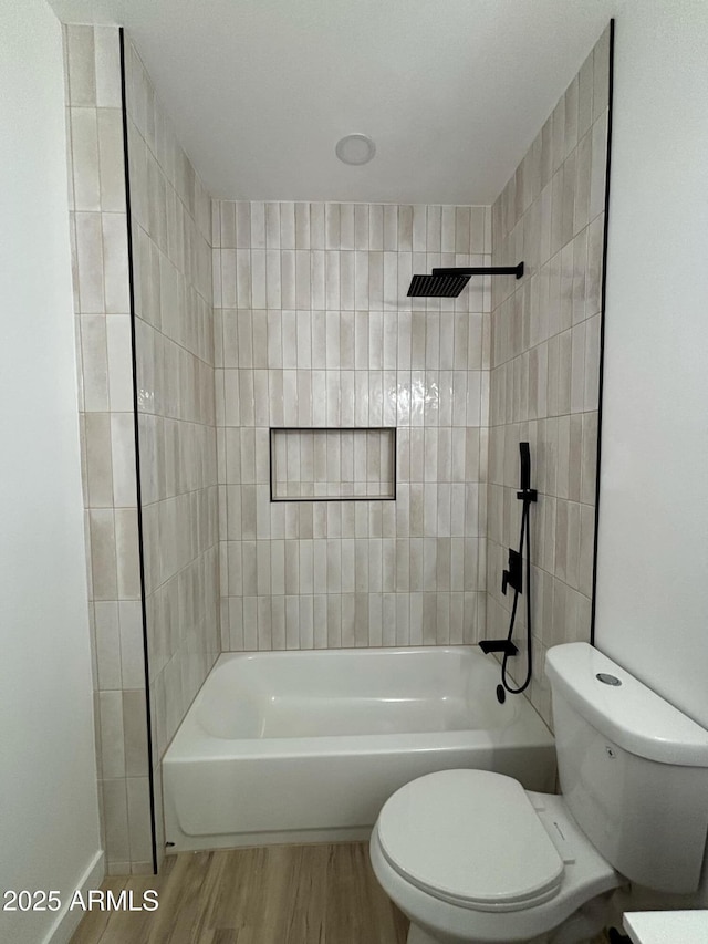 3627 W Palmaire Ave, Phoenix, AZ 85051 - bathroom with toilet, wood finished floors, and  shower combination