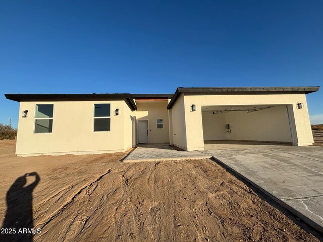 3627 W Palmaire Ave, Phoenix, AZ 85051 - single story home with stucco siding, a garage, and driveway