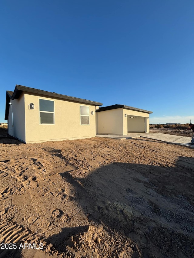 3627 W Palmaire Ave, Phoenix, AZ 85051 - view of side of home featuring stucco siding