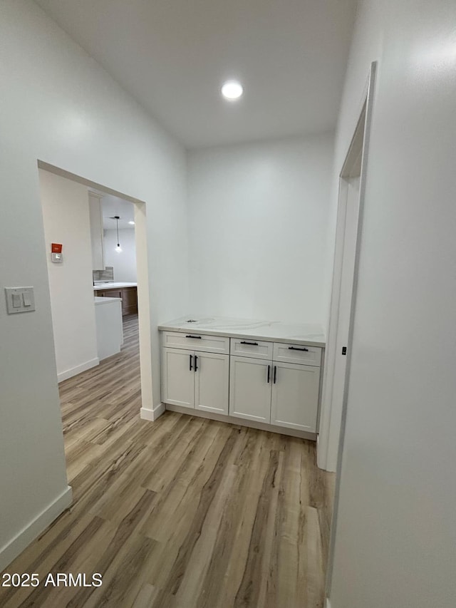 3627 W Palmaire Ave, Phoenix, AZ 85051 - corridor featuring light wood-type flooring, baseboards, and recessed lighting