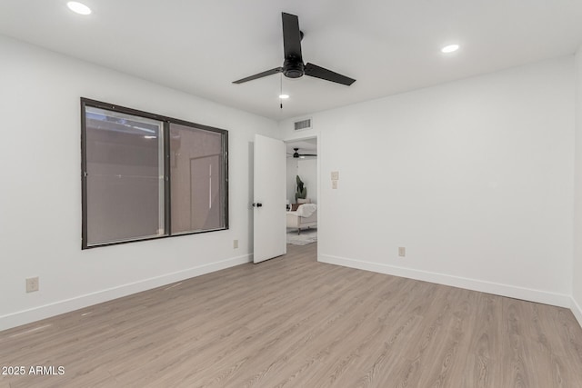 515 S Saguaro Way, Mesa, AZ 85208 - spare room with a ceiling fan, recessed lighting, and light wood-type flooring